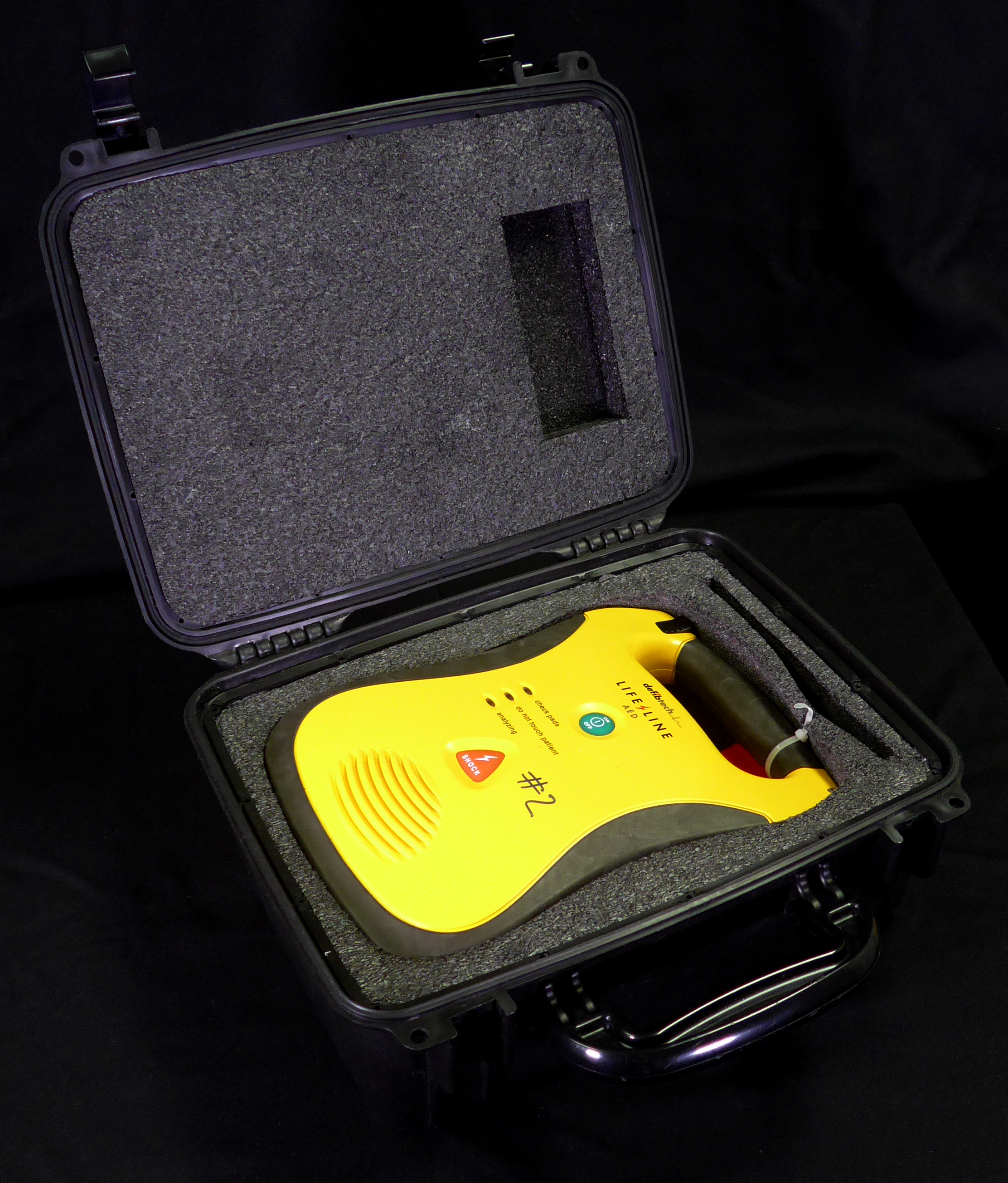 An AED inside its case