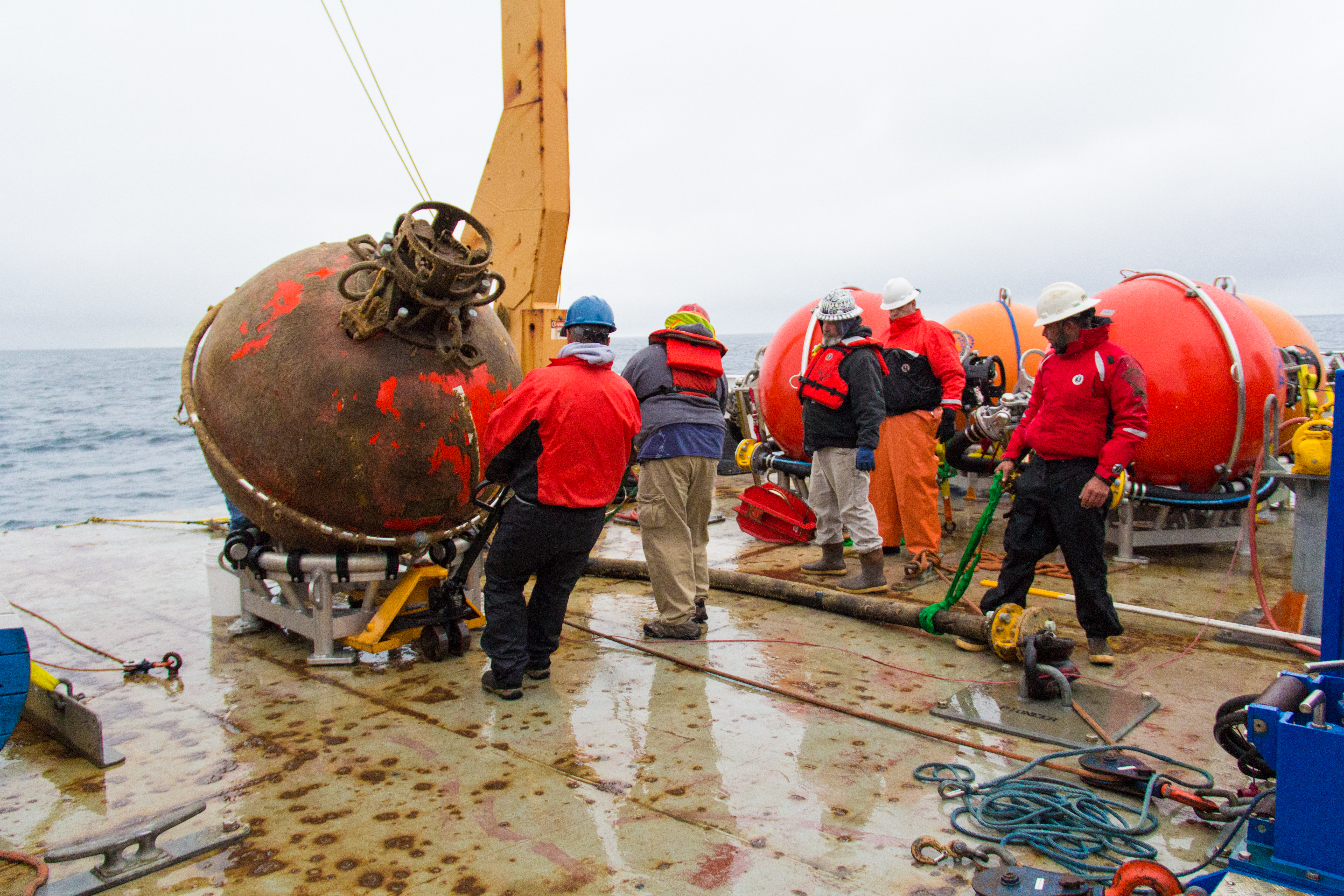 NOAA Ship Ronald H. Brown crew members recover buoys in the Gulf of Alaska in June 2016