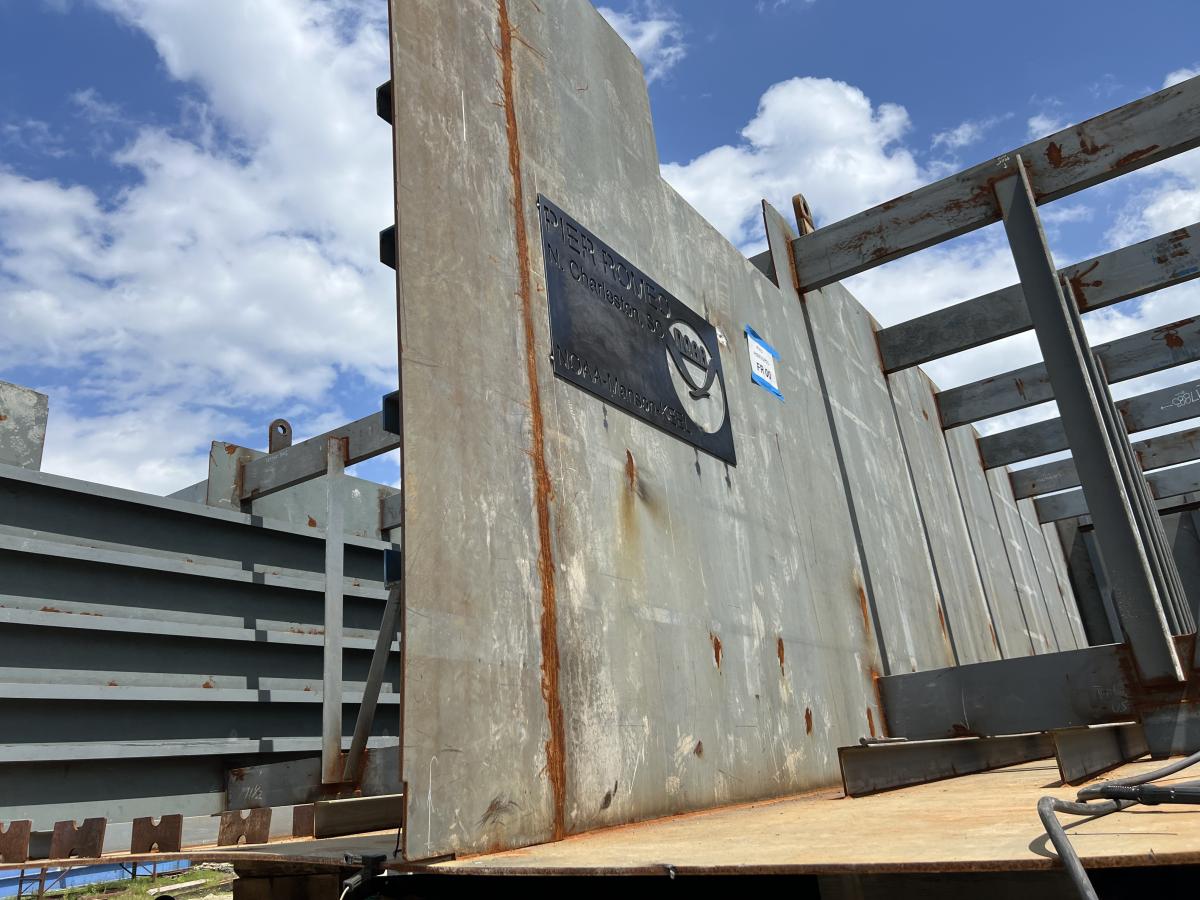 NOAA plate on the pier being constructed for NOAA