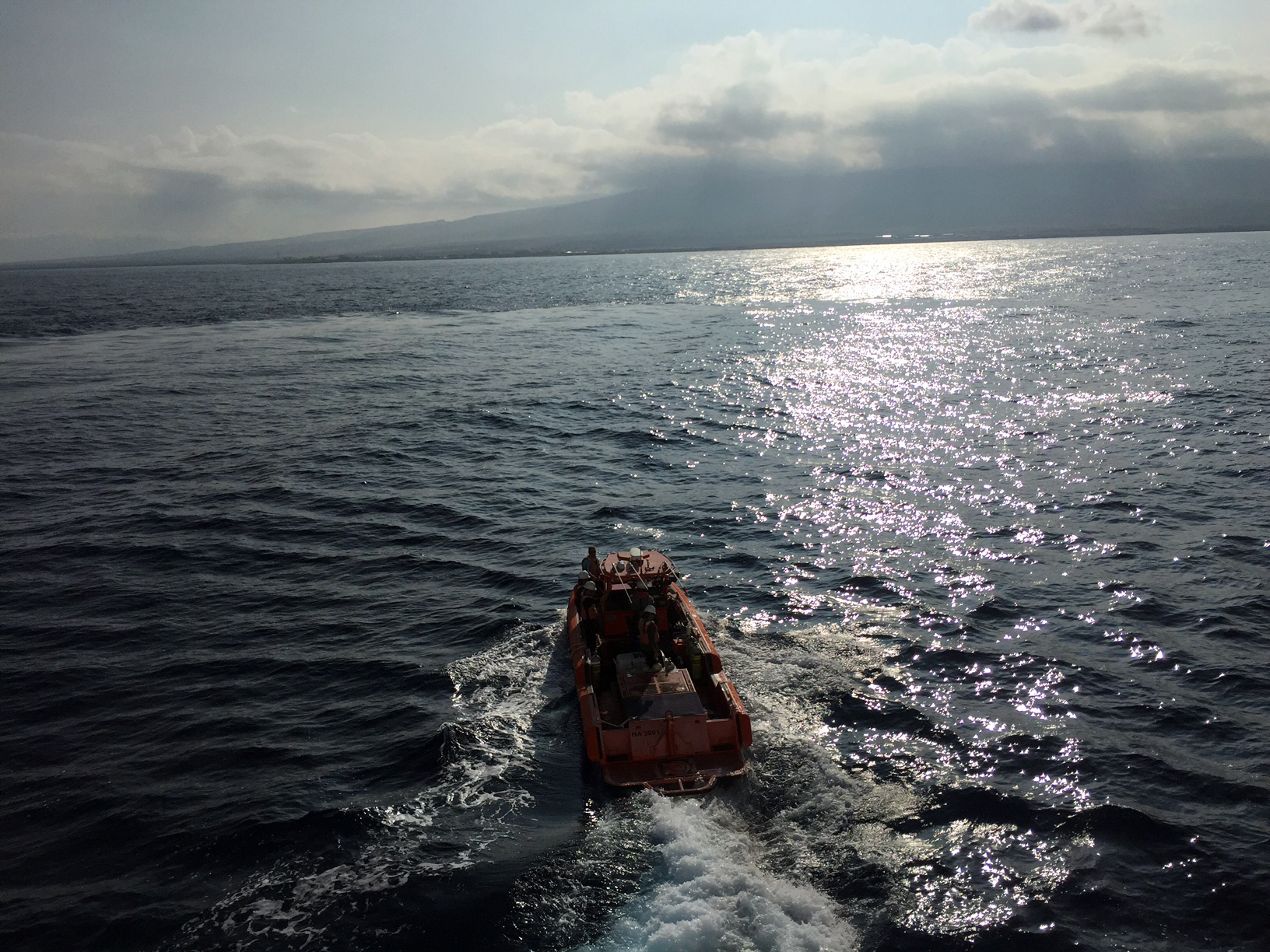 A boat heads to its diving location