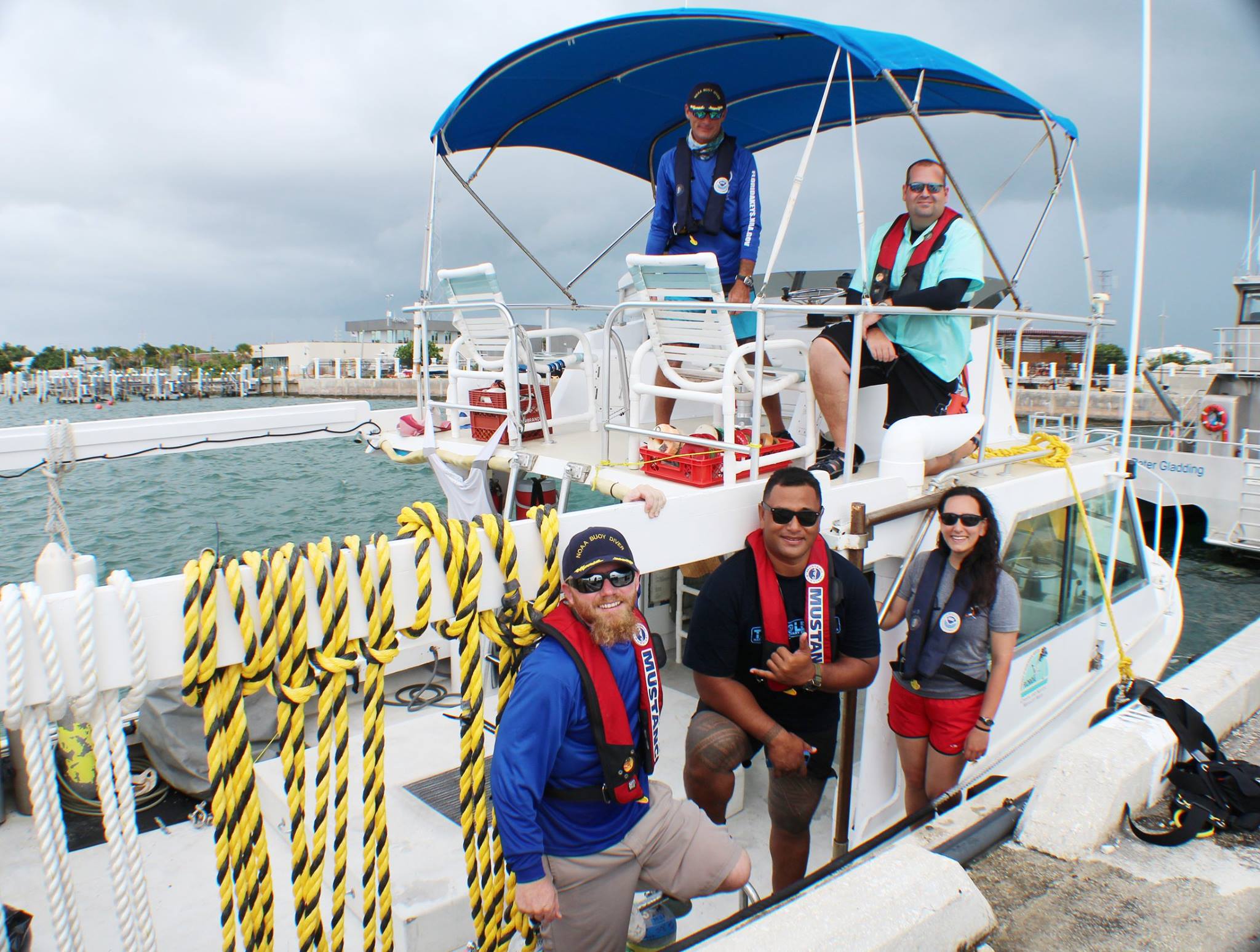 Pictured: (top row, left to right) Reciprocity Diver Adam Brynes, NOAA Diver Lt. Brian Elliot, (bottom, left to right) Reciproci