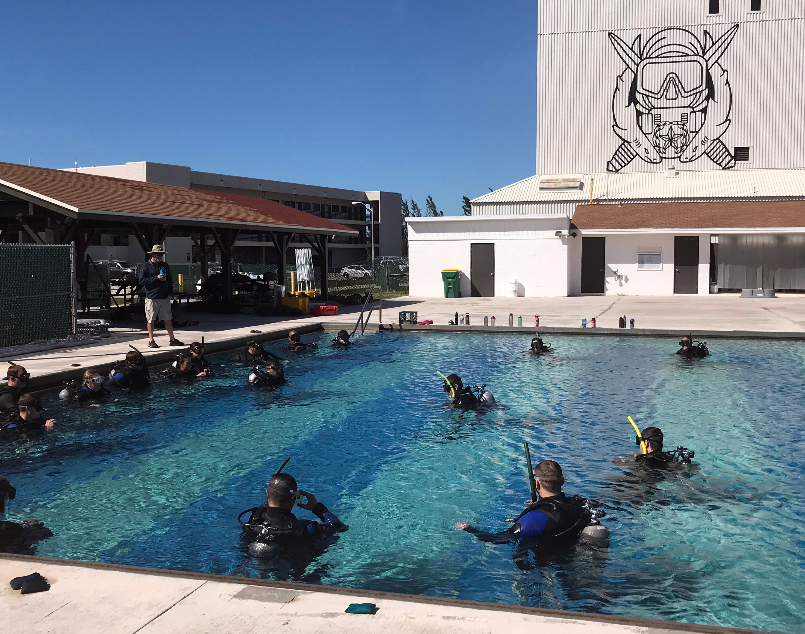 Divers training in a pool