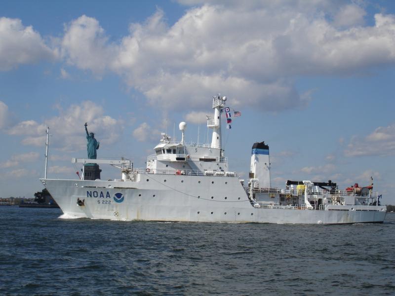 NOAA Ship Thomas Jefferson pictured with the Statue of Liberty