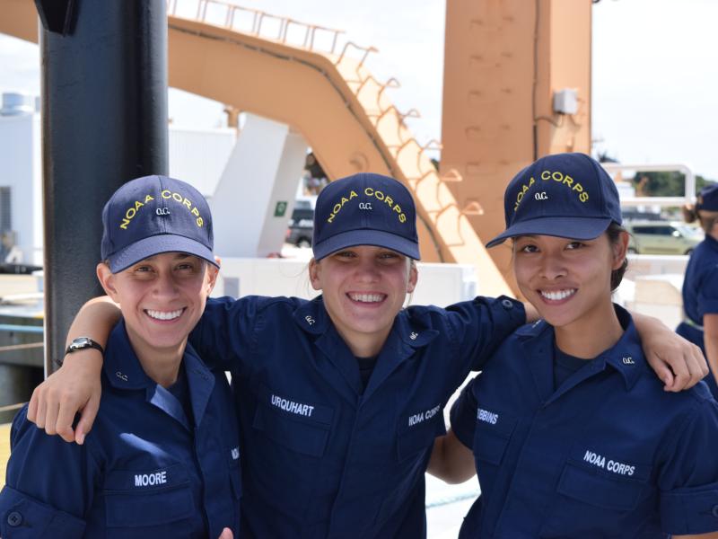 Three female NOAA Corps officer candidates aboard a NOAA ship