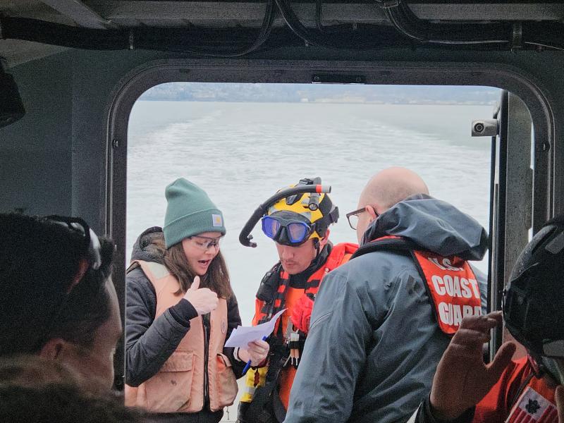 NOAA and US Coast Guard personnel practice skills for maritime emergencies.