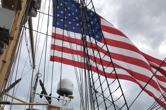 Anna Gordon on USCG Eagle, May 2022, Norfolk VA under a US flag