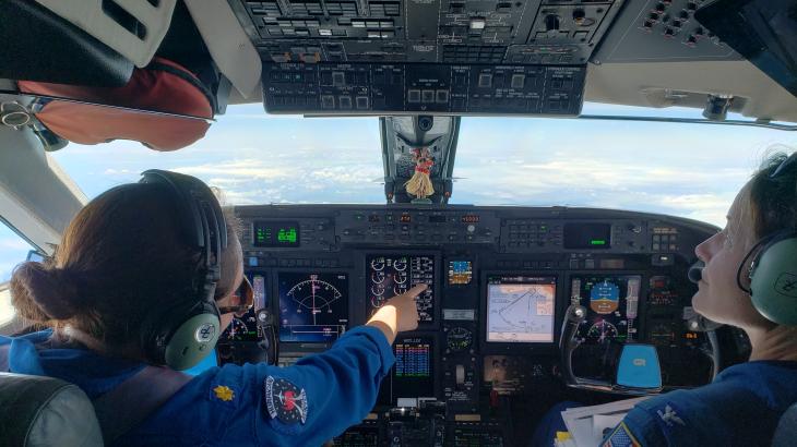 Pilots in cockpit of NOAA's Gulfstream IV