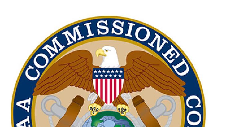 NOAA Corps emblem with eagle over globe