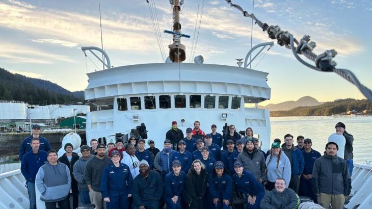 The crew of NOAA Ship Fairweather is pictured on the bow as the vessel arrives at it's new homeport in Ketchikan, AK for the first time.